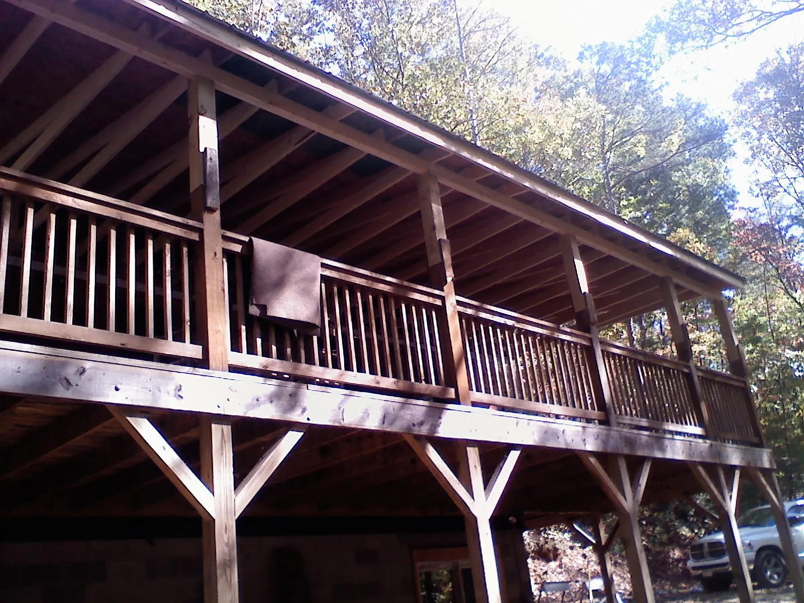 Timber framing under a new elevated porch and deck — Roof Leak Repair in Morganfield by Roofing Brothers